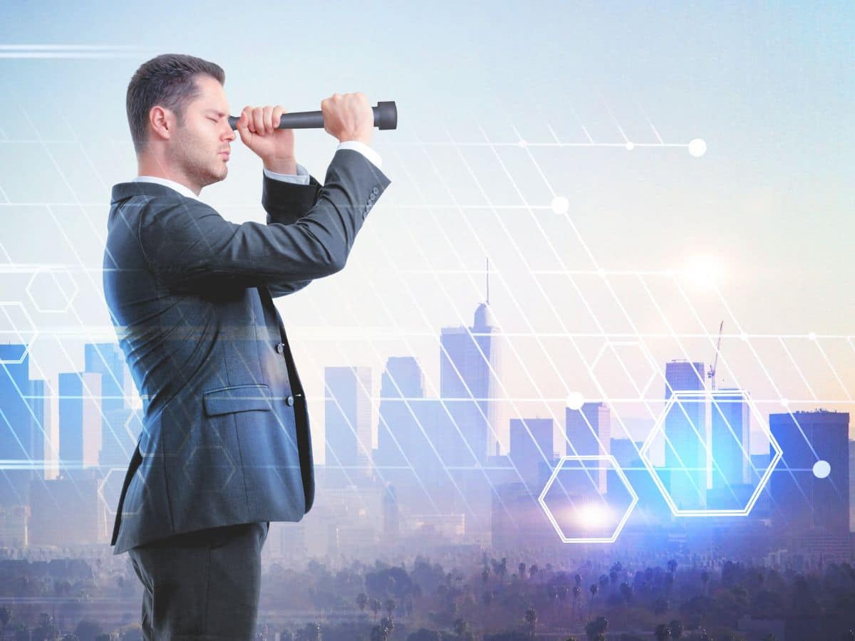Image of businessman looking through a telescope could represent the need to look beyond the obvious to see the potential of new ideas.